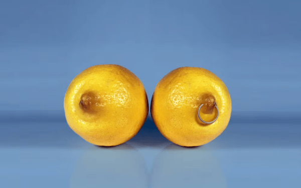 2 lemons on a blue background