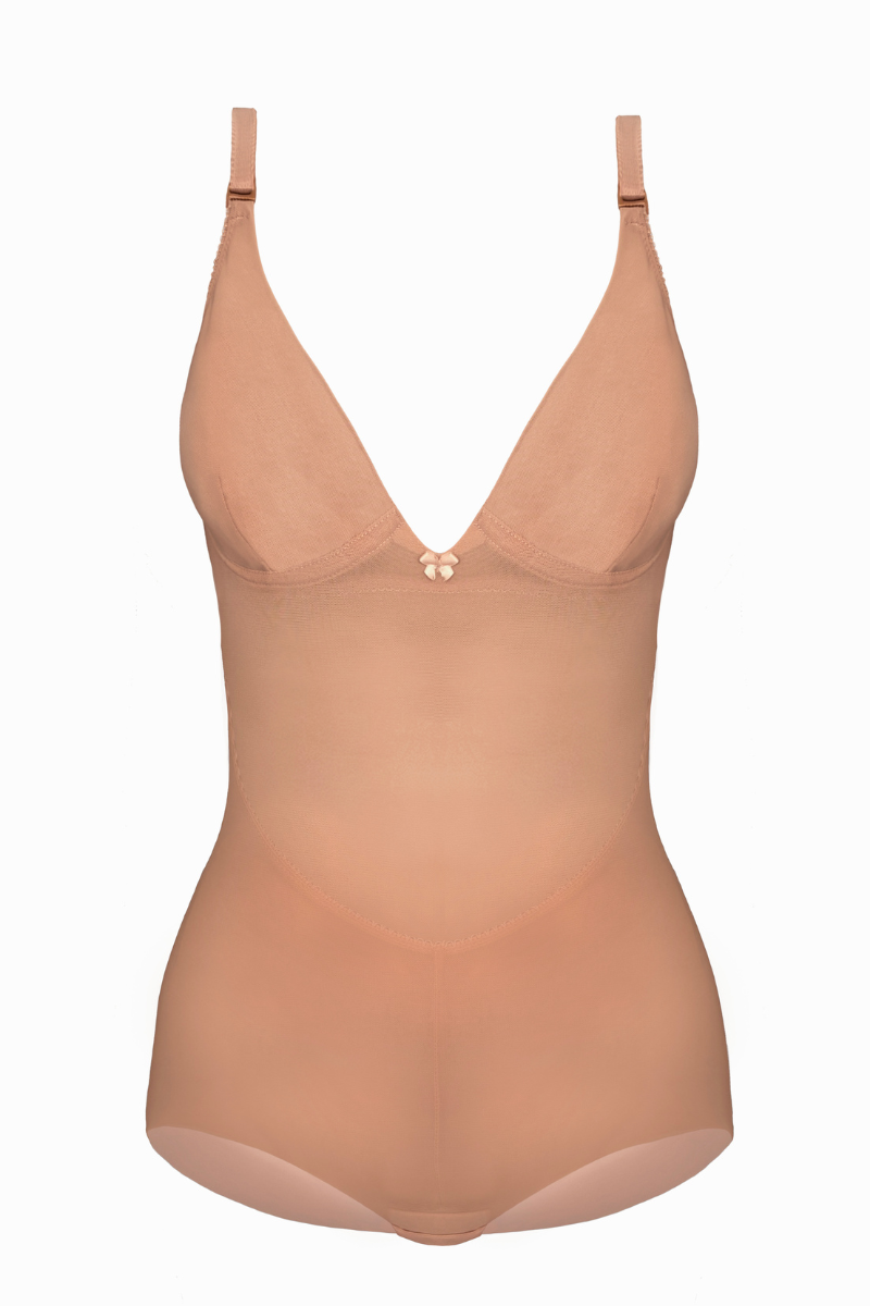 Woman wearing a Soft Cup bodysuit Shaper in beige mesh with Shorts on a white background