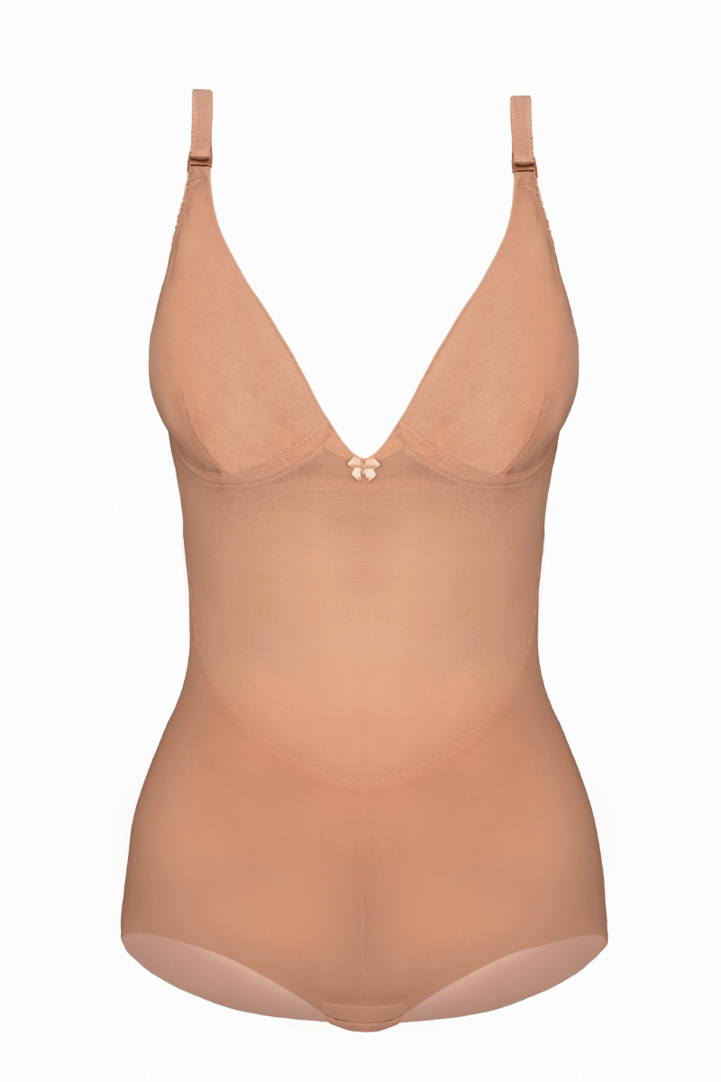 Woman wearing a Soft Cup bodysuit Shaper in beige mesh with Shorts on a white background