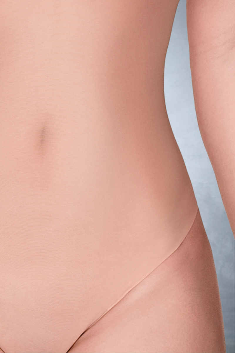 Close up view of low back shaper bodysuit in beige mesh with high apex bra as seamless bridal underwear for wedding dress