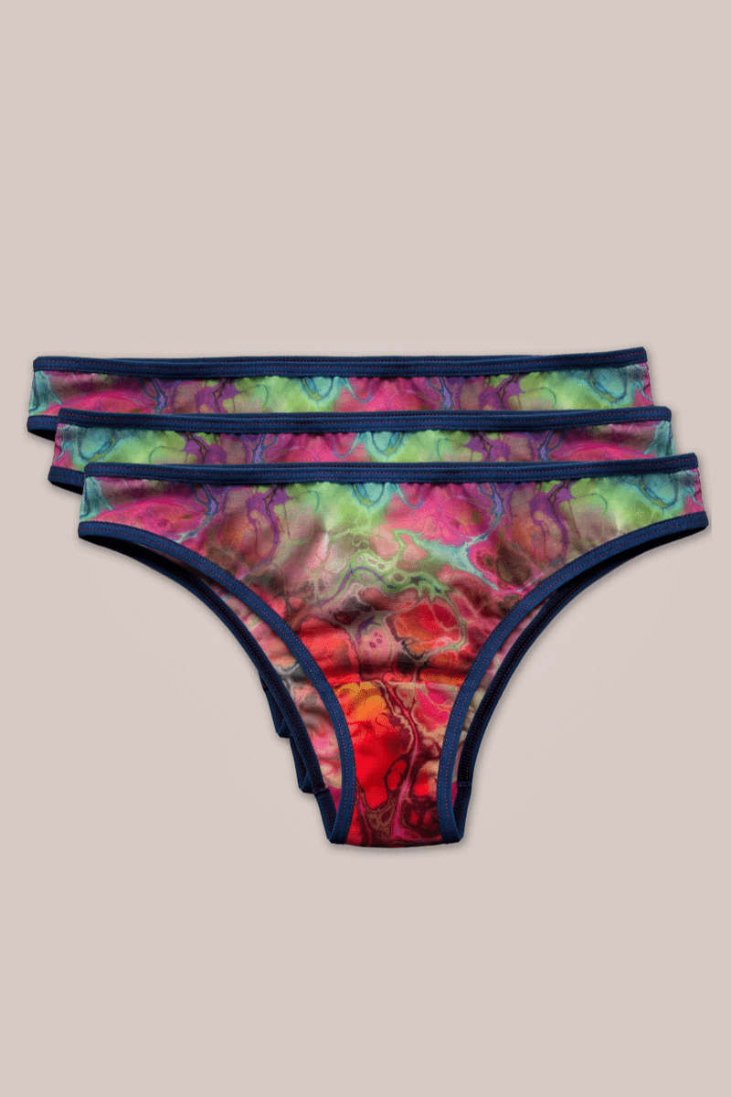 Front flat lay picture of ENDER LEGARD PIXIE briefs in custom pattern called Sunset Bloom as a set of 3 pairs