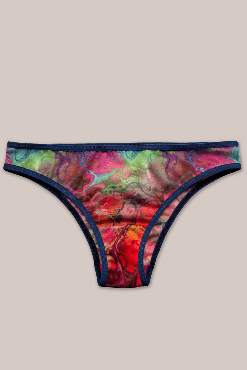 Front flat lay picture of ENDER LEGARD PIXIE briefs in custom pattern called Sunset Bloom as worn on a woman