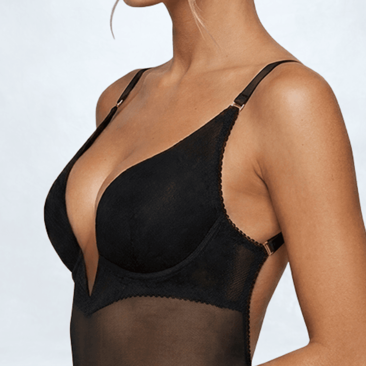 Close-up side view of the Ender Legard KYA Black soft cup showing the underwire, smooth inner cup edge, adjustable shoulder strap, gold-tone adjuster and underarm attachment.