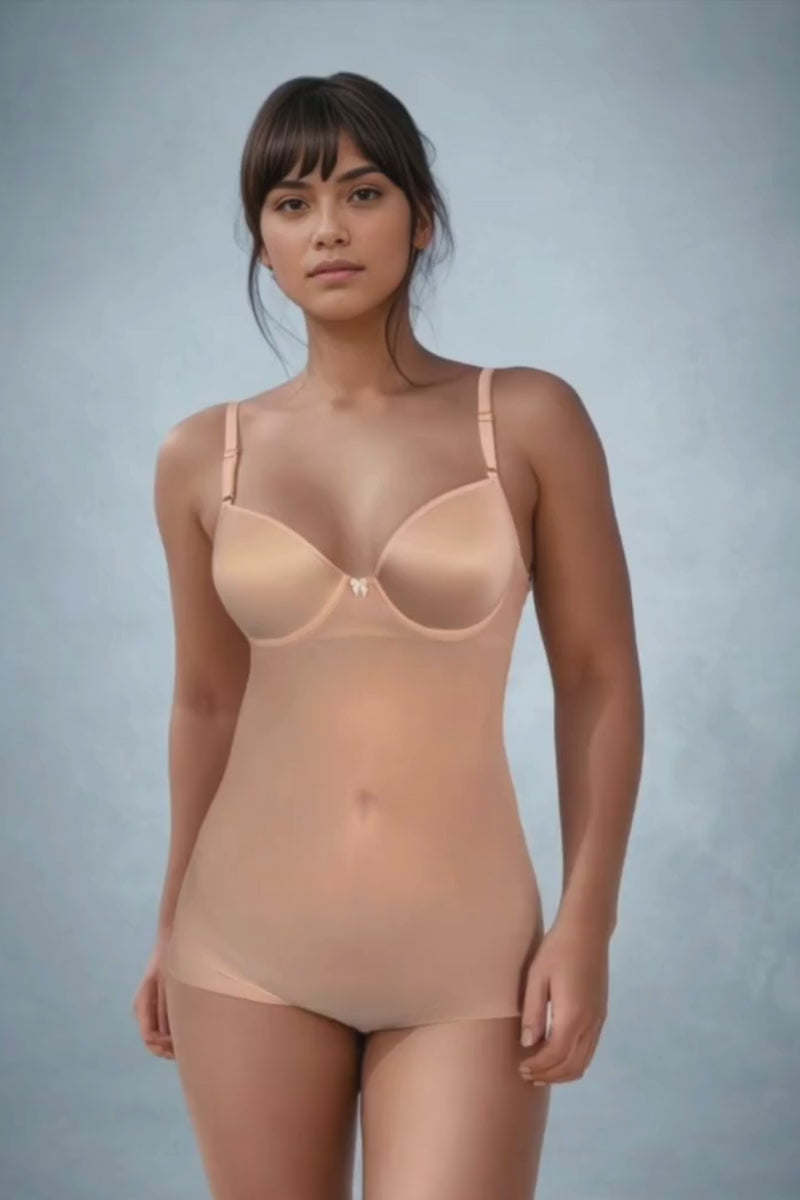 Video of a dark haired woman wearing a beige bodysuit by Ender Legard