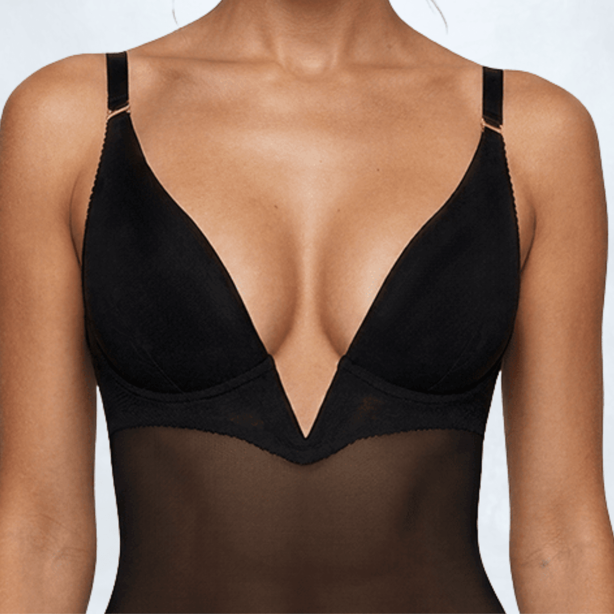 Close-up of the Ender Legard KYA Black cup construction showing underwired soft cups framing the flat V-separator, smooth inner cup edges and adjustable shoulder straps with gold-tone hardware.