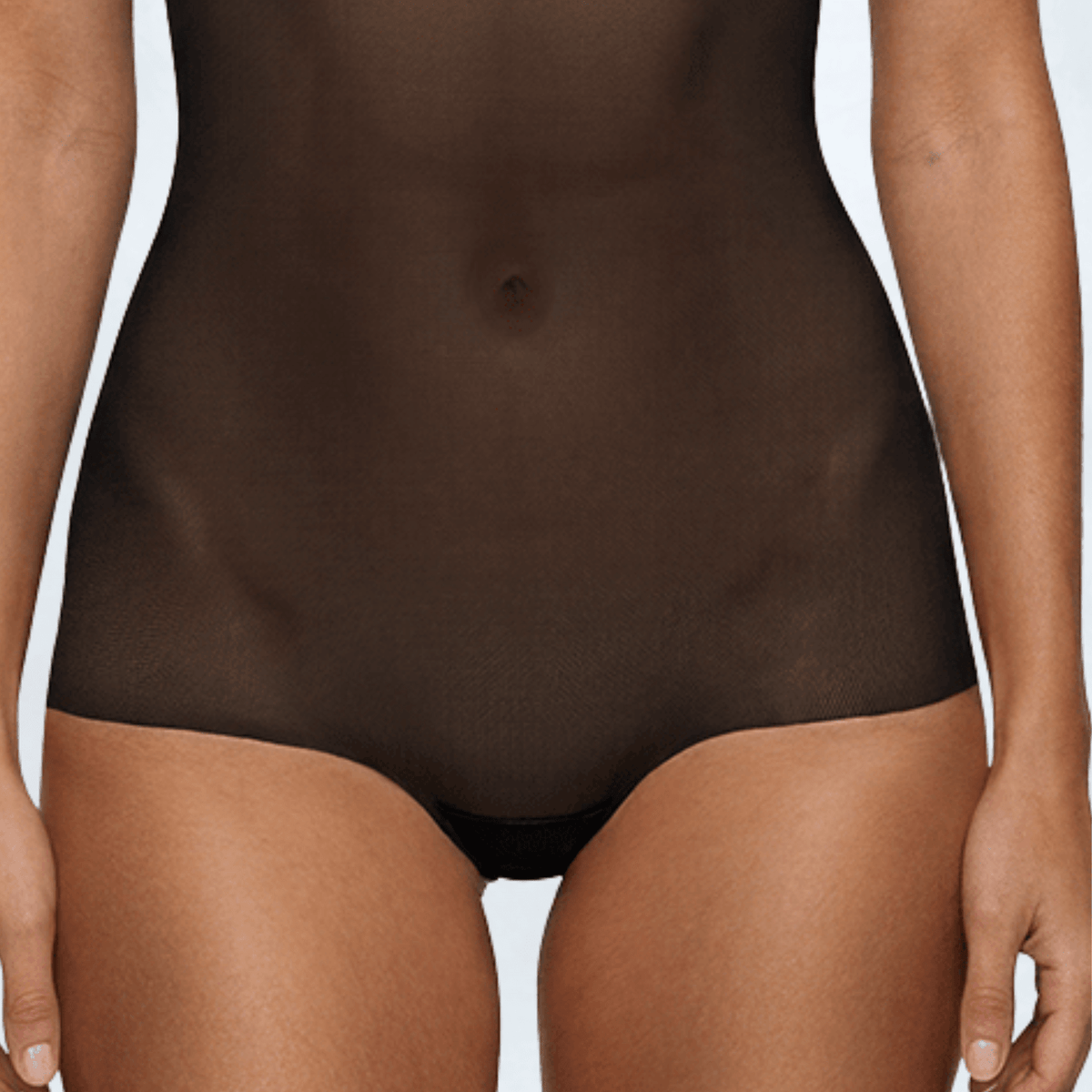 Close-up of the Ender Legard KYA Black bodysuit showing the semi-sheer power-mesh front panel across the abdomen and hips, continuing into the full briefs with flat front leg edges.