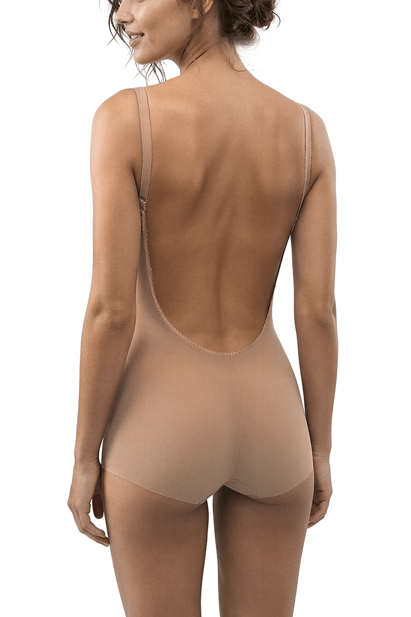 Back view of the Ender Legard KYA Nude backless bodysuit showing adjustable shoulder straps, the ultra-low open back with no conventional bra back band, centre-back seam and full briefs with flat leg edges.