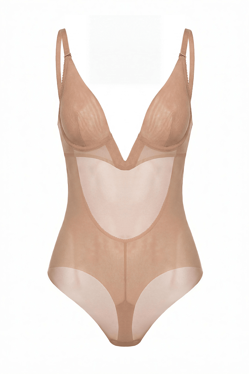Ender Legard LIV Nude backless bodysuit shown unworn, showing the full construction: underwired deep-V cup with flat V-separator, adjustable straps, sheer power-mesh body and high-leg tanga briefs with raw-cut edges.