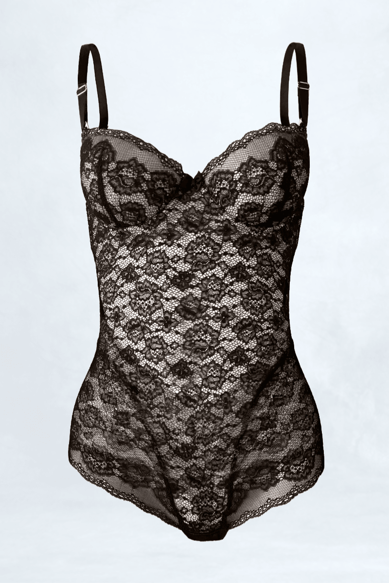 Ender Legard UMA Black bodysuit, front view unworn with the underwired balconette cups, adjustable shoulder straps, stretch-lace torso and the tanga brief's high-leg openings visible.