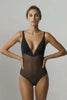 Ender Legard LIV Black backless bodysuit in motion showing the deep-V cup fit, ultra-low back with no bra back band and tanga-brief coverage.