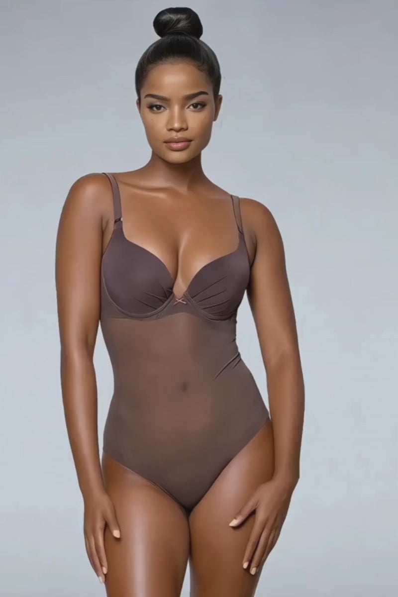 Ender Legard MAE Brown backless bodysuit in motion showing moulded cup fit, smooth body construction, low open back and tanga brief cut.