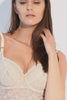 Ender Legard HOLLY Ivory bodysuit in motion, showing front and side views of the full-coverage cups and bra straps running over the shoulders, then turning to reveal the ultra-low back and high-leg tanga briefs.